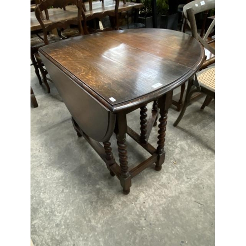 193 - Oak barley twist drop leaf table 74H 90W 120D