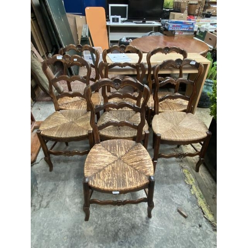 221 - 7 French oak rush seated dining chairs (1 as found)