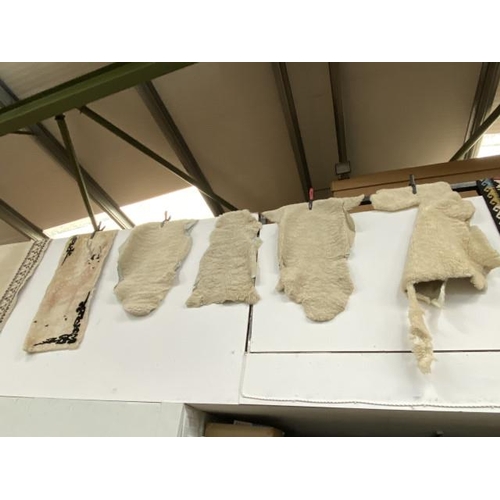 237 - 4 sheepskin rugs & one other 98 x 55cm, 112 x 80cm, 98 x 50cm, 100 x 70cm & 136 x 58cm (all as found... 