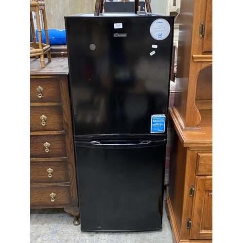 241 - Black Candy fridge freezer 133H 55W 56D