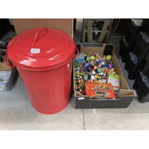 536 - Small red dustbin and a box of pocket money toys (new stock)