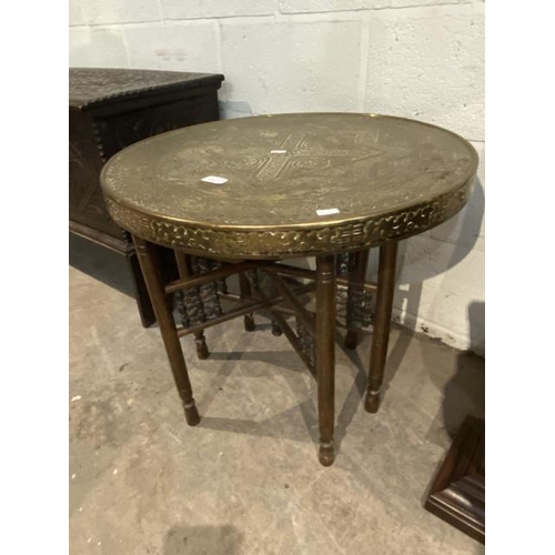 71 - Middle Eastern brass topped table 56H 60cm diameter