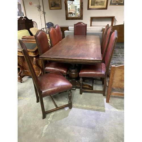 83 - Oak draw leaf table 77H 183-273W 92D and 8 chairs