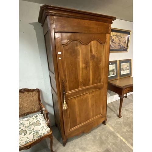 134 - French fruitwood Bonnetiere with shelves to the interior 206H 118W 60D (signs of worm, sold as seen)