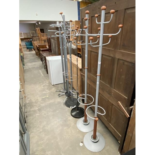 141 - 7 assorted hat/coat stands