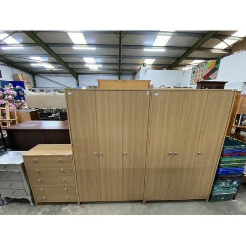 2 beech effect triple wardrobes (with hanging rail & shelves to the interior) 175H 103W 50D and a matching 5 drawer chest 90H 66W 33D