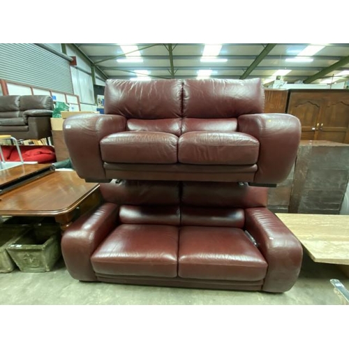 63 - 2 burgundy leather settees 170W & 195W