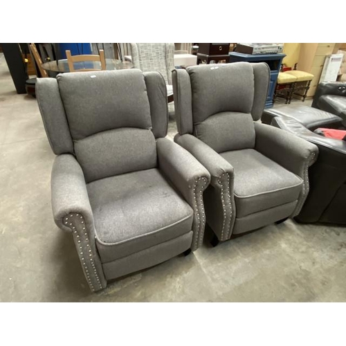 2 grey upholstered manual reclining armchairs (Sonic Online Ltd) 70W (fabric will require cleaning)