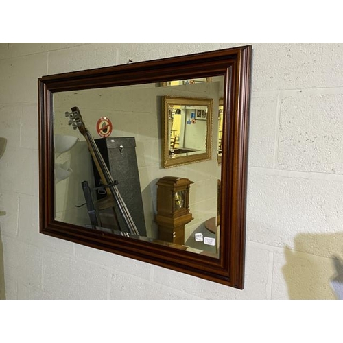 23 - Mahogany framed bevel edged mirror 75 x 102cm