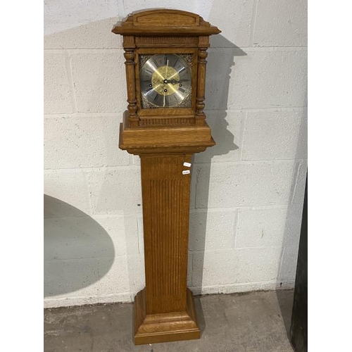 25 - Franz Hermle, German 8 day mantel clock with winding key siting on an oak plinth (clock 40H 30W 20D ... 