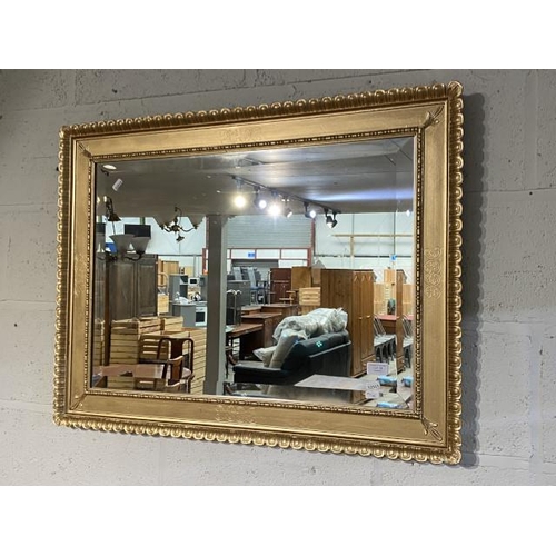 26 - Gilt framed bevel edged mirror 66 x 86cm