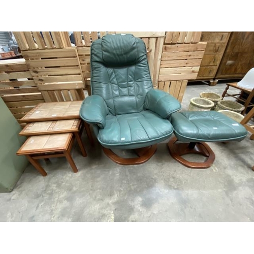 46 - Green leather swivel reclining armchair 82W with matching footstool & a tiled topped nest of 3 table... 