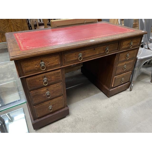 48 - Antique oak pedestal desk with red leather inset 75H 122W 65D