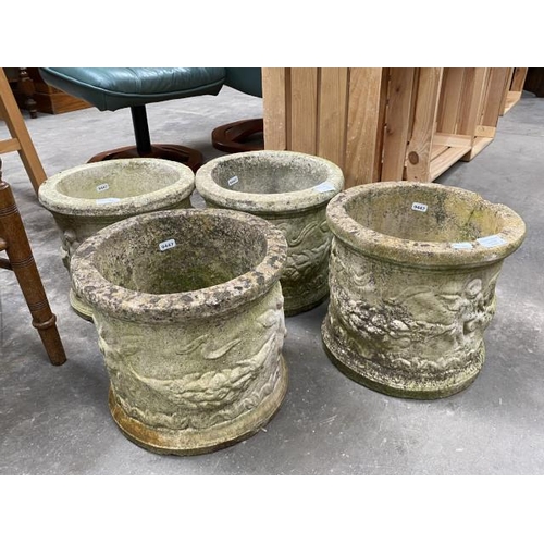 66 - 4 stone effect planters 26H 29cm diameter