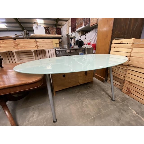 81 - Contemporary oval dining/office table with chrome legs and tempered glass top 76H 190W 100D