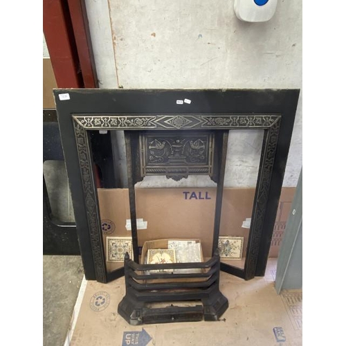 106 - Cast iron fireplace surround 96H 97W with tiles
