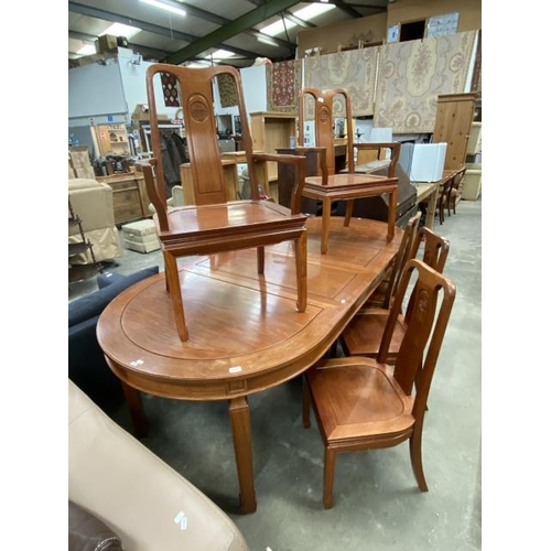 109 - Chinese rosewood extending dining table and 7 chairs including 2 carvers 78H 243W 111D