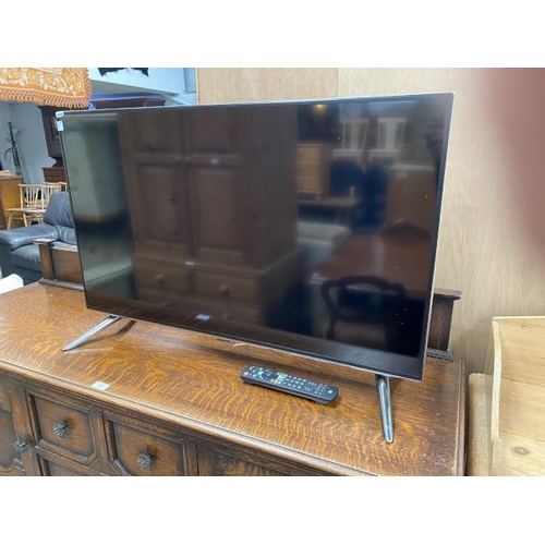 111 - Panasonic TX-40CX400B TV with power lead and remote not working