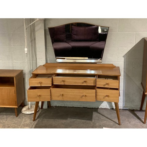 64 - Mid century Alfred Cox for Heals walnut dressing table 137H 121W 47D and a matching bedside cupboard... 