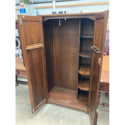 46 - 1930's oak linen fold fitted wardrobe 155H 90W 46D