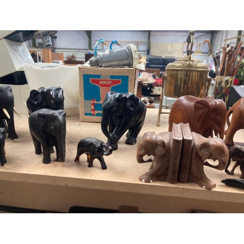 454 - 24 Elephant ornaments, two pairs of Elephant bookends, Two Rhinoceros, letter opener inc. ebony, res... 