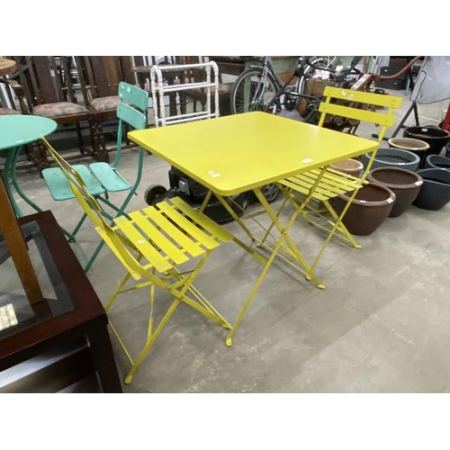 112 - Metal garden table 71H 70W 70D and 2 folding chairs