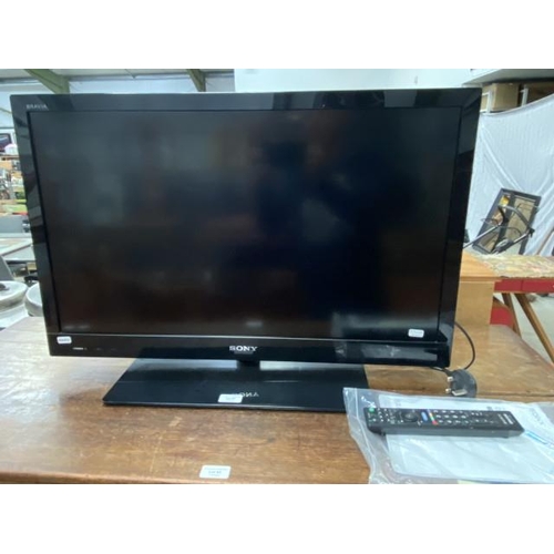 91 - Sony KDL-32EX310 TV with power lead and remote