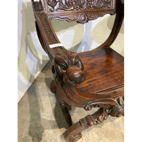 101 - Circa 1900 carved walnut hall chair 58W - A Isherwood carved to back of chair