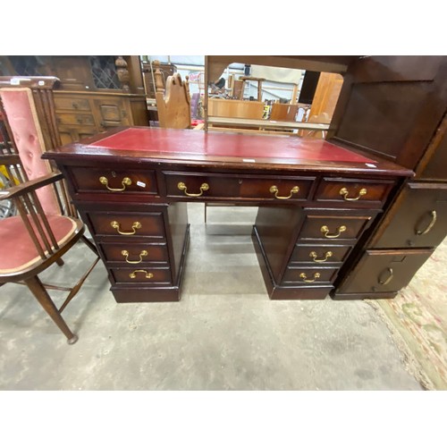 512 - Mahogany pedestal desk with red leather inset 79H 121W 60D