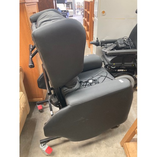 64 - MODULO CARE RISER RECLINER CHAIR (colourway - Black)  Purchased in 2022.     
Adjustable Seat width ... 