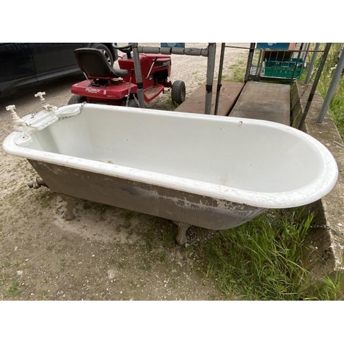 251 - A cast iron roll top bath on ball and claw feet 64H 188W 73D