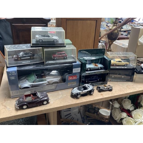 553 - 12 model cars inc. Vanguards, Majorette, Maisto, Solido etc.