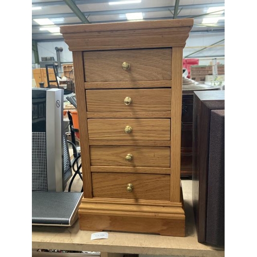 558 - Light oak 5 drawer chest 24W 44H