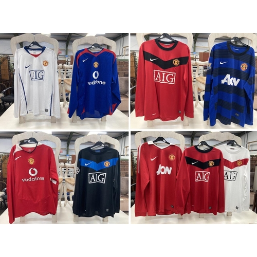 608 - 9 Manchester United adult long sleeved football shirts: 2009 home (size L), 2012 home (size L), 2009... 