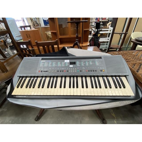 75 - Yamaha PSR-300 keyboard with stand, charger, music and carry bag