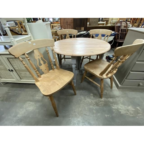 101 - Pine drop leaf table 73H 114cm diameter and 4 pine chairs