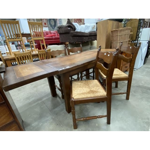 134 - Solid oak farmhouse extending table 75H 222W 76D and 4 chairs