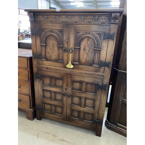 17 - Carved oak cocktail cabinet 140H 94W 49D