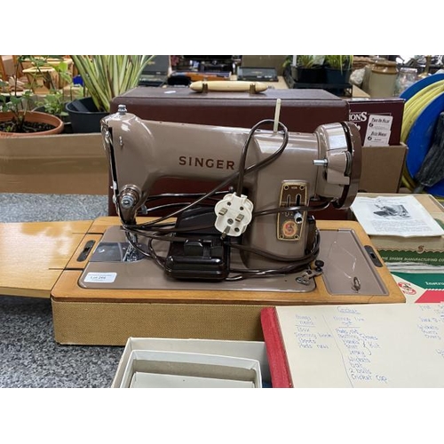 266 - Cased Singer 185K electric sewing machine with foot pedal, instruction book, button hole attachment ... 