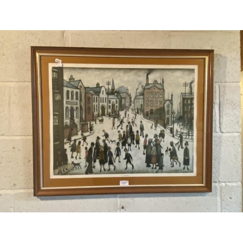 304 - Framed L.S. Lowry print 'A Village Square' 62 x 77cm