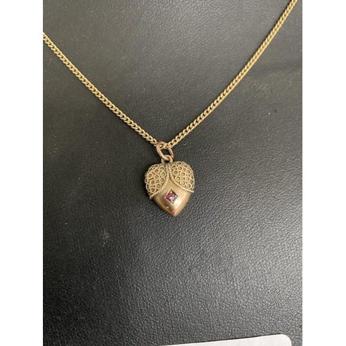 320 - 9ct gold necklace (chain length 40cm) and locket (4.2g)