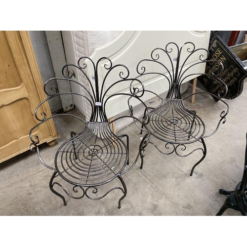 49 - Pair of metal garden chairs (new) 70W