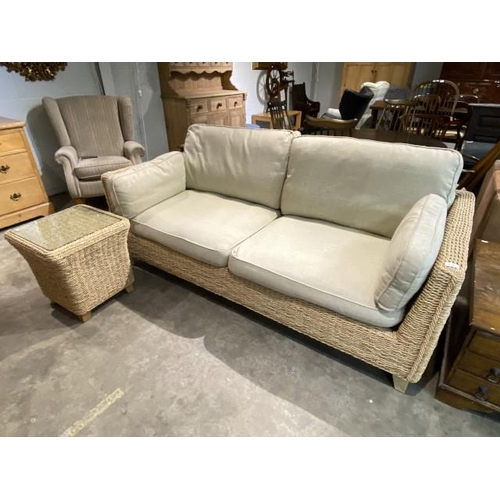 76 - Seagrass settee with cream linen cushions 196W and a matching side table 50H 46W 46D