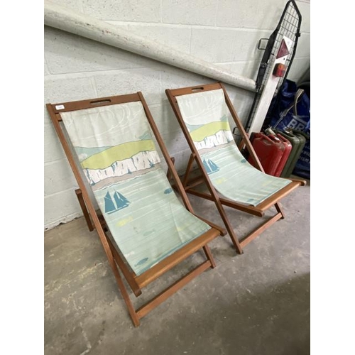 9 - 2 teak framed deck chairs