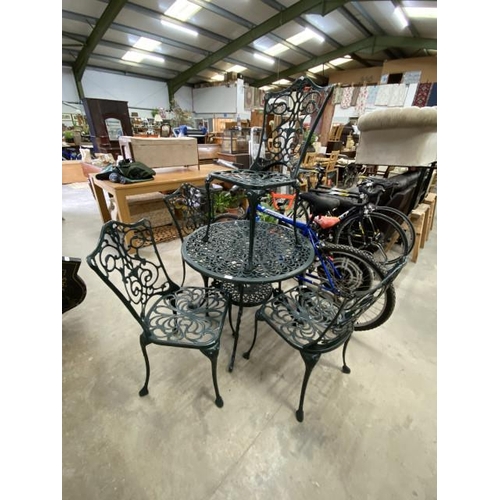 95 - Aluminium garden table 67H 86cm diameter and 4 chairs