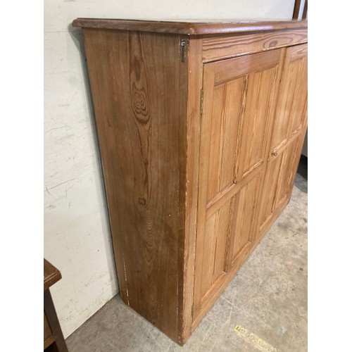 81 - Vintage pine school cupboard with one key and shelves to the interior 123H 142W 43D