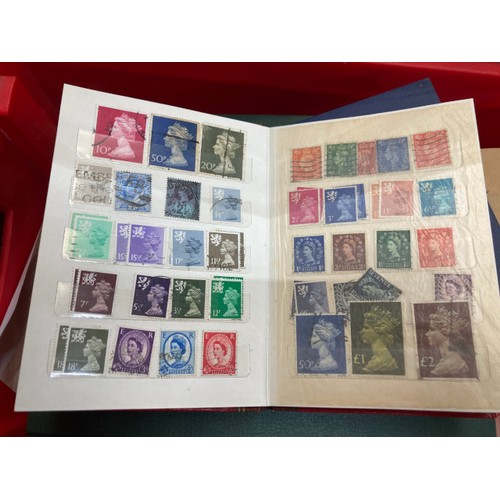 447 - Collection of stamps and ephemera consisting of albums, tins full of stamps and reference books, ass... 