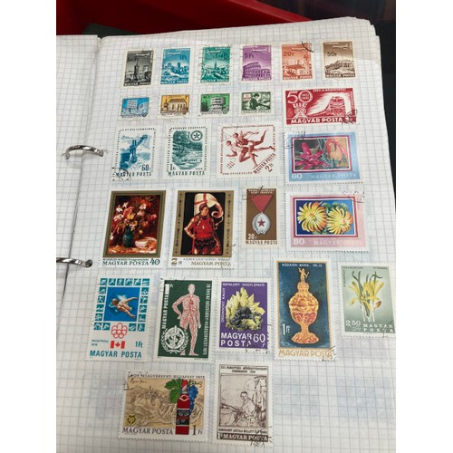 447 - Collection of stamps and ephemera consisting of albums, tins full of stamps and reference books, ass... 