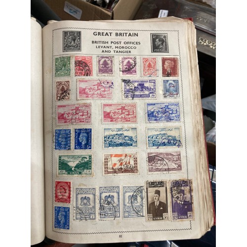 447 - Collection of stamps and ephemera consisting of albums, tins full of stamps and reference books, ass... 