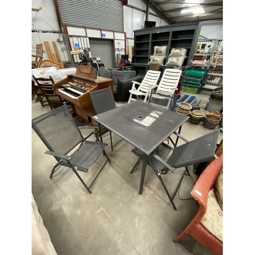 100 - Grey garden table 72H 90W 90D and 4 folding chairs